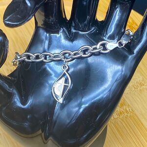 Ladies .925 silver bracelet with intricate cross pendent w/makers marks 7” long